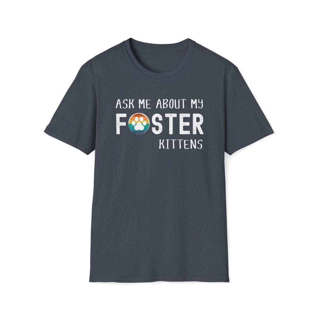 Heather Navy soft t-shirt with text that reads ‘Ask Me About My Foster Kittens’ and a retro styled rainbow paw-print graphic in the word Foster