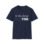 Navy Tee with bold text TNR Be the Change with minimalist line art design of a cat with upright tail and a small heart designed to appeal to Trap Neuter Release advocates and feral cat trappers