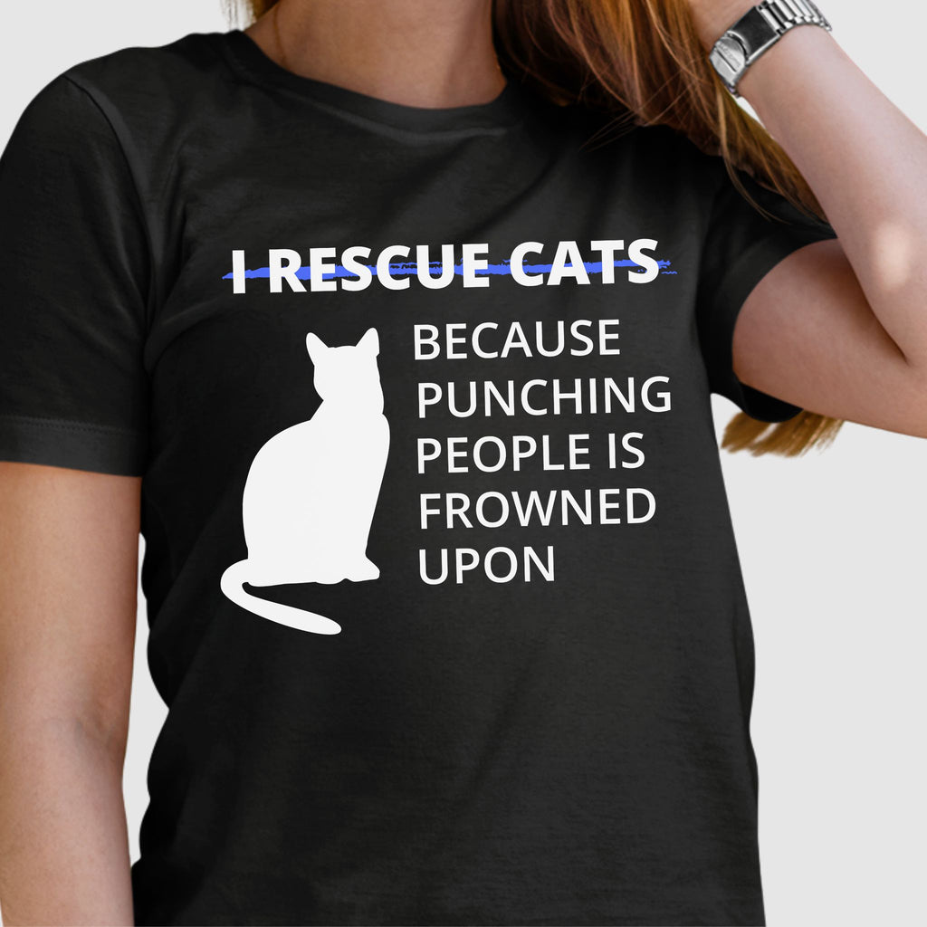 Black t-shirt with a white cat graphic and humorous text on a plain background text reads I rescue cats because punching people is frowned upon funny animal resucue shirt with some sass