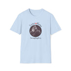 Light blue t-shirt with a graphic of a cat and text on a white background