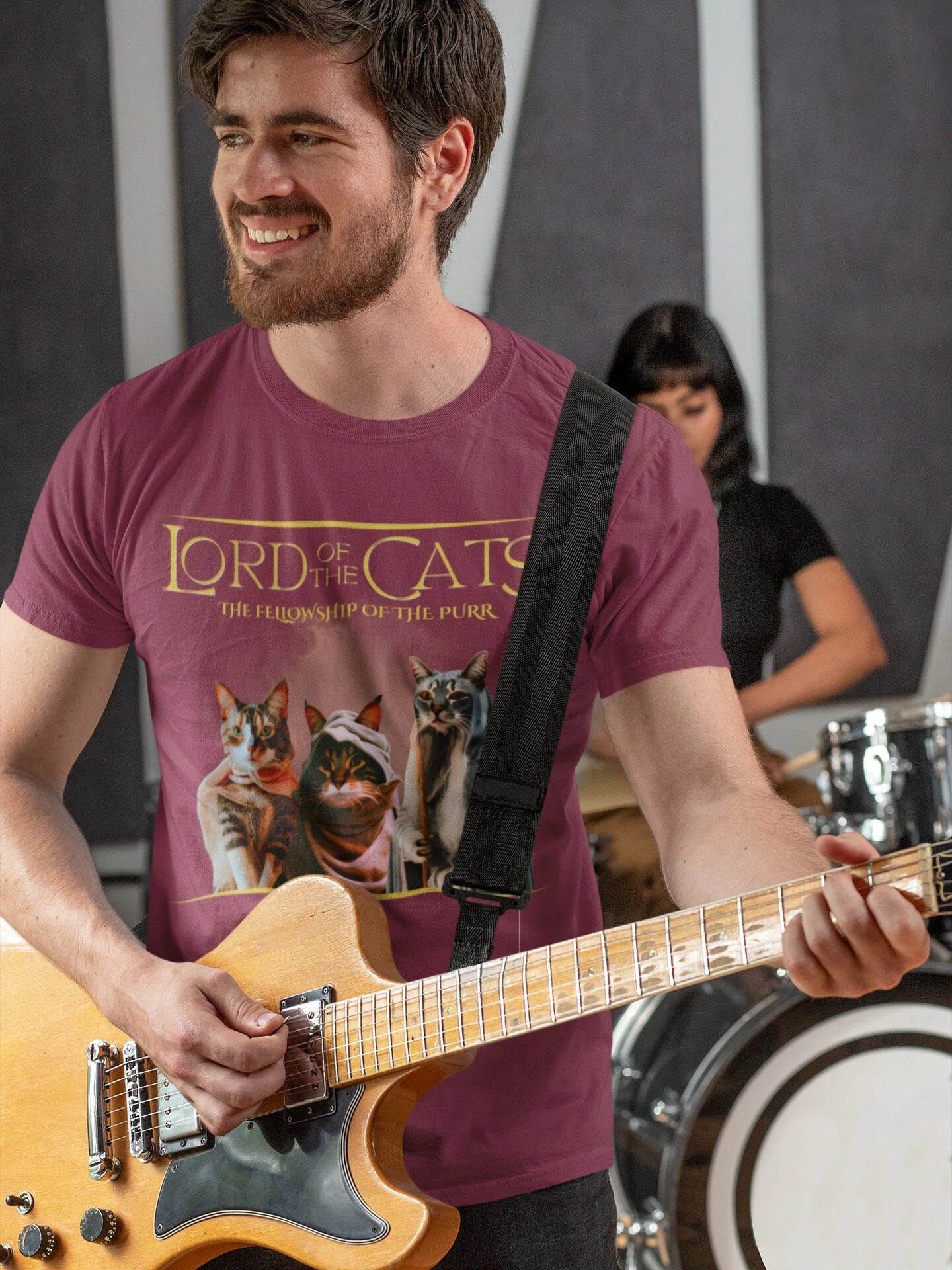 t-shirt featuring three cats dressed in fantasy-style cloaks with text ‘Lord of the Cats – The Fellowship of the Purr.’ Movie Parody. Soft 100% ringspun cotton cat lover shirt gift for cat dad cat mom or cat loving movie fan.