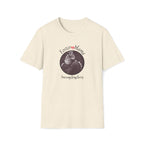 Beige t-shirt with a graphic of a cat and text 'Foster Mama Saving Tiny Lives' on a white background